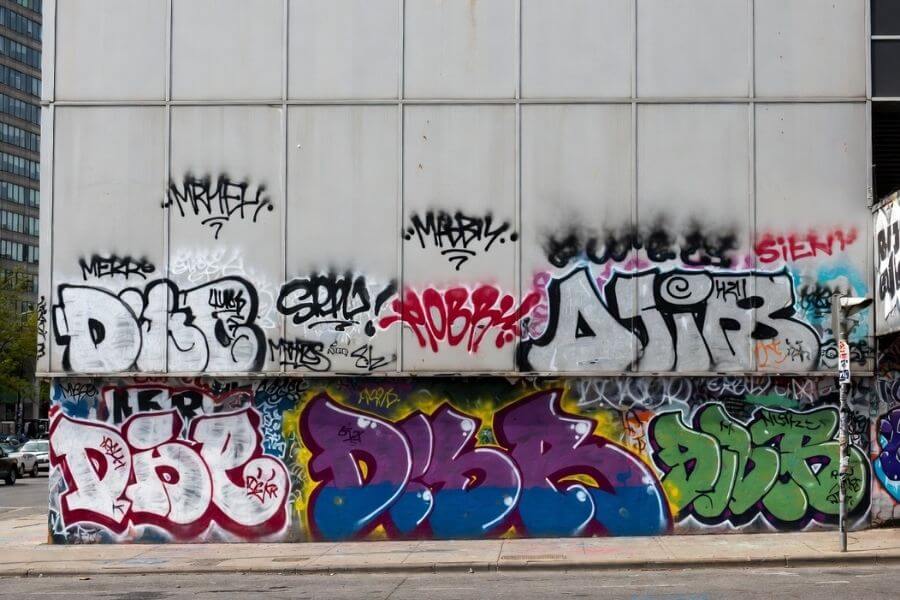 graffiti on aluminum composite panels facade urban building damage graffiti on aluminum composite panels facade urban building damage